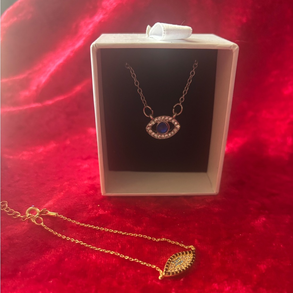 J144 NIB Blue Opal/Crystal Eye Charm w/ 16”-18” adj silver chain & gold bracelet